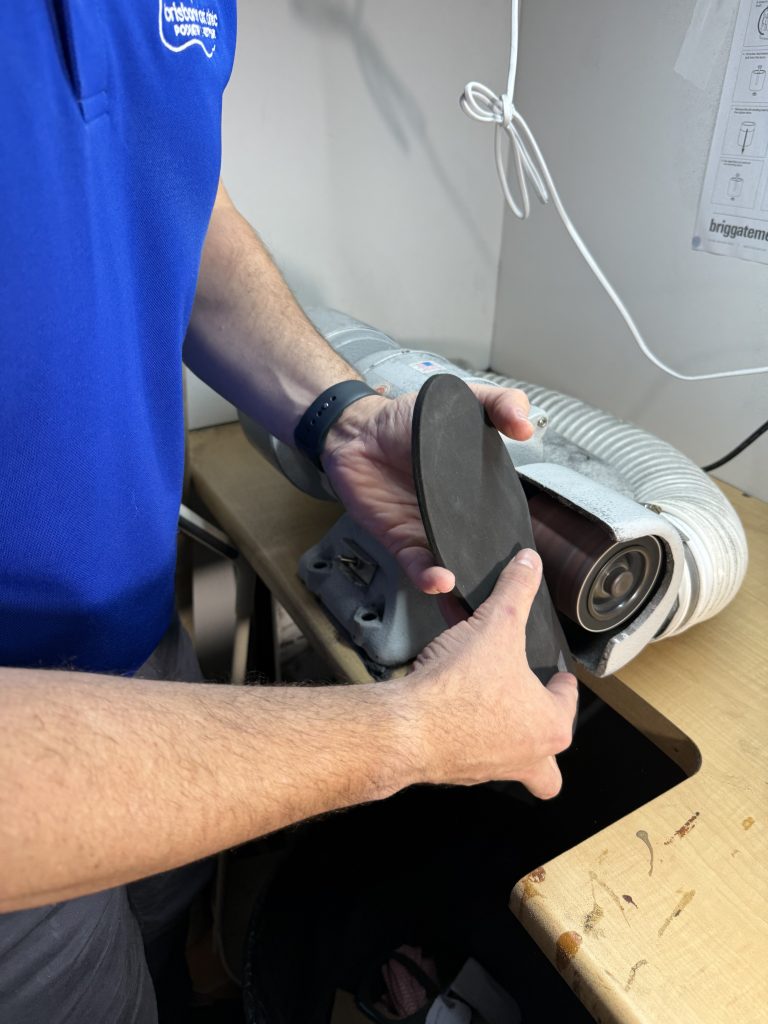 https://brisbanefootclinic.com.au/wp-content/uploads/2026/06/orthotics-grinding-close-up-768x1024.jpeg